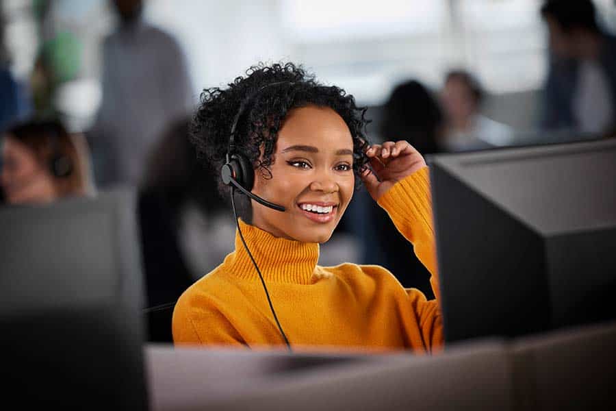 Woman wearing contact center headset